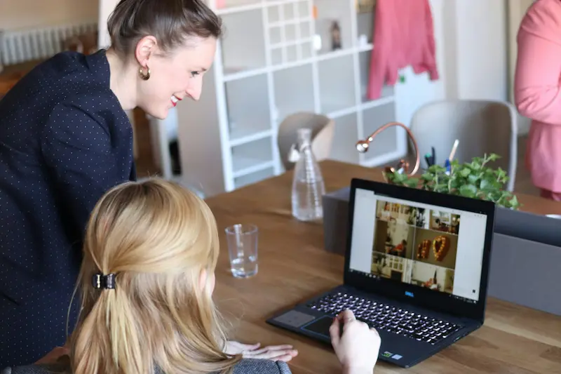 Mother teaching her daughter how to run the family business