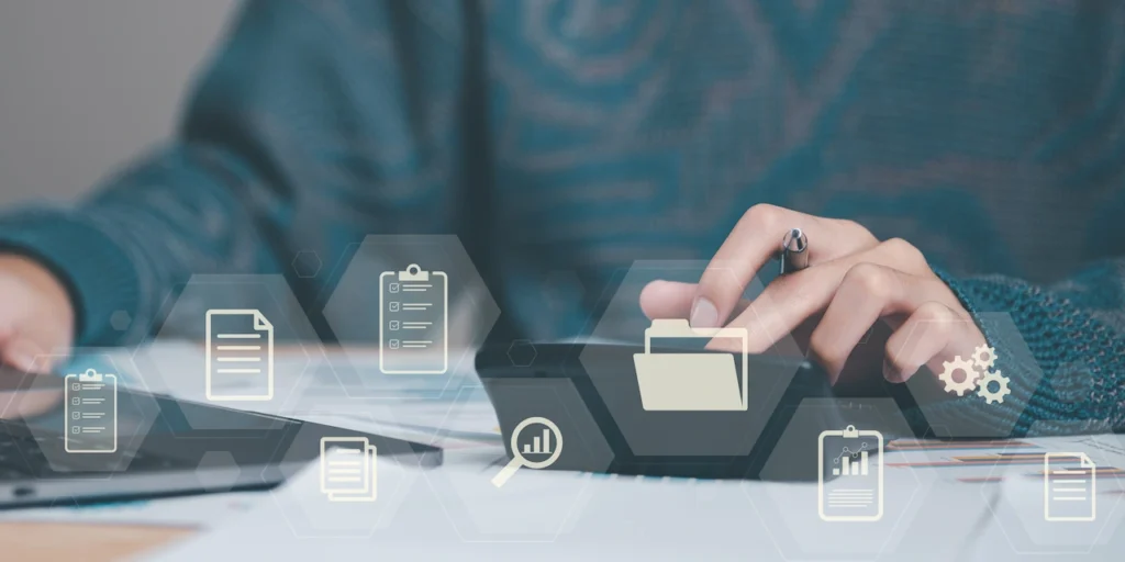 Person working with documents and technology